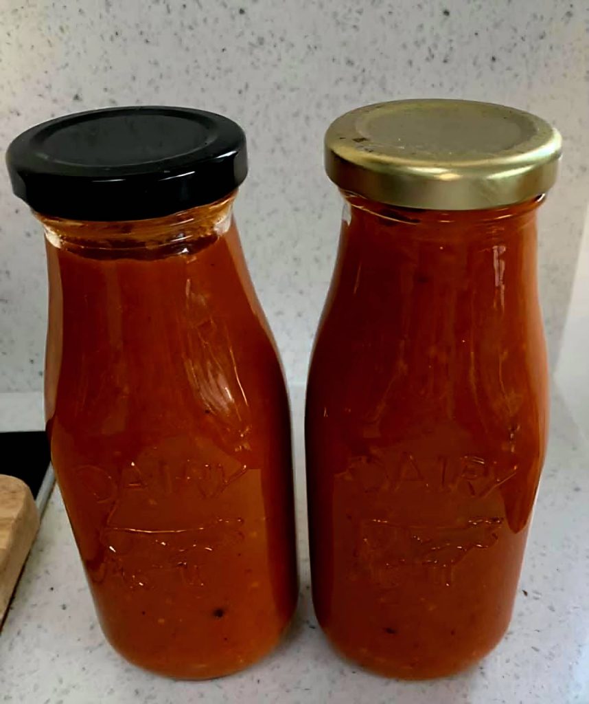 Home made tomato sauce already in glass jars and ready for use,